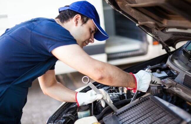 A mobile mechanic repairing an alternator under the bonnet of a car, highlighting the process of mobile alternator repair in Sydney. A mobile mechanic repairing an alternator under the bonnet of a car, highlighting the process of mobile alternator repair in Sydney.