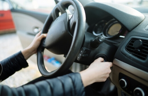 Driver turning the ignition key while experiencing starter motor issues, ideal for True Blue Mobile Mechanics starter motor replacement service in Sydney. Driver turning the ignition key while experiencing starter motor issues, ideal for True Blue Mobile Mechanics starter motor replacement service in Sydney.