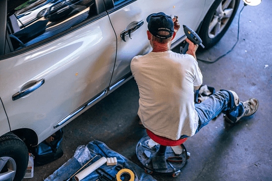 A technician from True Blue Mobile Mechanics performing car belt replacement melbourne and car leaking oil melbourne services in Hallam. A technician from True Blue Mobile Mechanics performing car belt replacement melbourne and car leaking oil melbourne services in Hallam.